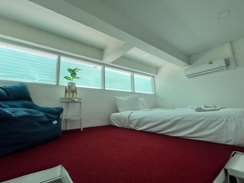 Postel nebo postele na pokoji v ubytování LimeTree Loft Guesthouse