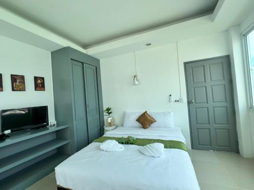 Postel nebo postele na pokoji v ubytování LimeTree Loft Guesthouse