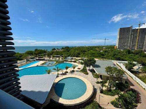 Bazén v ubytování Santa Marta apartamento con vista al mar- santamarina-709 nebo v jeho okolí