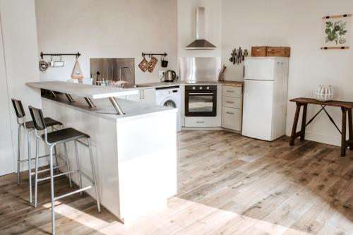 Een keuken of kitchenette bij Gîte de la maraîchère