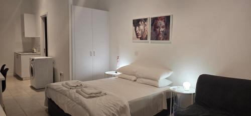 Postel nebo postele na pokoji v ubytování Habito Luxury Apartment - Breakbooking CY