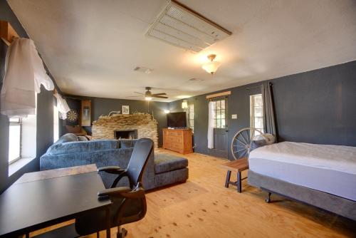 a living room with a couch and a bed at 6 Mi to Laughlin AFB Cozy Studio with Private Yard in Del Rio