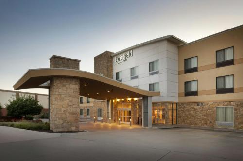 a hospital building with a large building with a entrance at Fairfield Inn & Suites by Marriott Lincoln Southeast in Lincoln