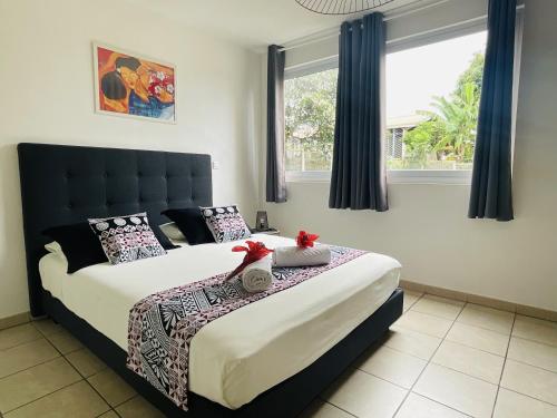 Postel nebo postele na pokoji v ubytování Prestige Lodging City Center