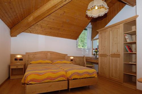 Postel nebo postele na pokoji v ubytování Hotel Karinhall