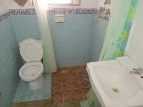 Koupelna v ubytování Hostal República