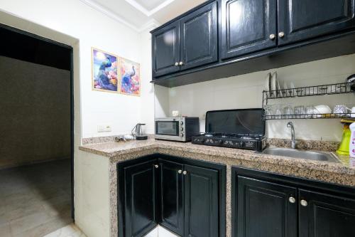 Kuchyň nebo kuchyňský kout v ubytování Riad Bollywood- International