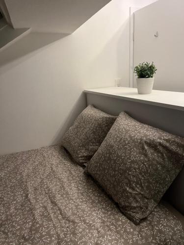 Postel nebo postele na pokoji v ubytování Le Refuge du Cerf