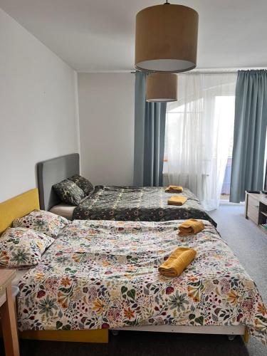 Ένα ή περισσότερα κρεβάτια σε δωμάτιο στο Apartmán Tília Bešeňová