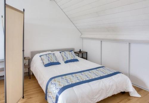 Llit o llits en una habitació de Ty Ker Lannig