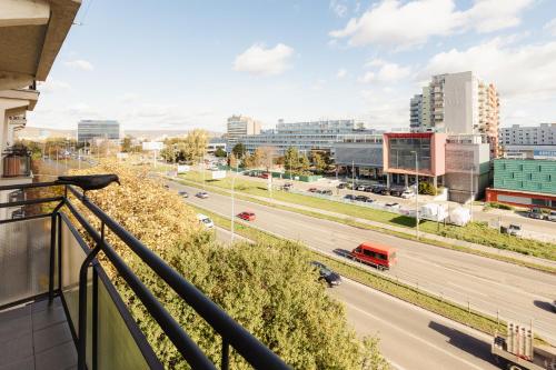 a view of a city from a balcony at BNB Sklenarova Apartment with Balcony in Trnávka