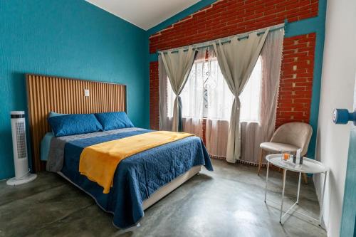 Ένα ή περισσότερα κρεβάτια σε δωμάτιο στο Apartment in Convention Center, Oaxaca