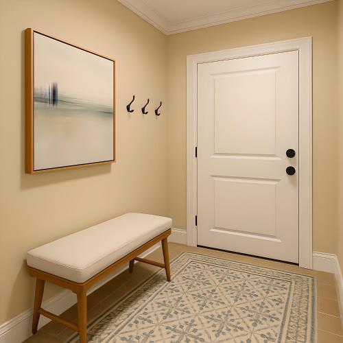 een kamer met een witte deur en een bank bij Jackson Pearl in Jackson