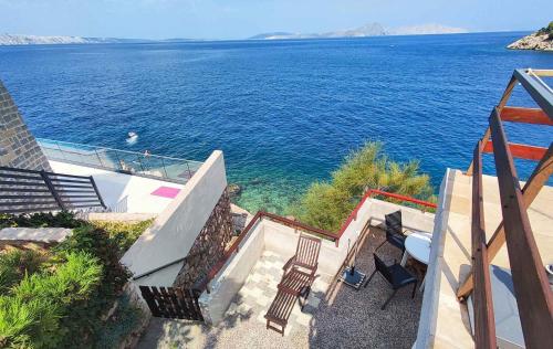 a view of the ocean from a house at Apartment Starigrad - Senj 1 in Starigrad
