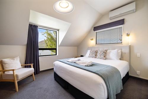 En eller flere senge i et værelse på Lodges 1 - Lake Front