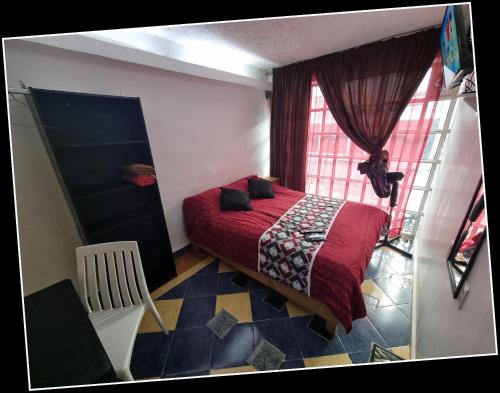 Postel nebo postele na pokoji v ubytování Practiquísimo Departamento AxA - 01 - rentaflex