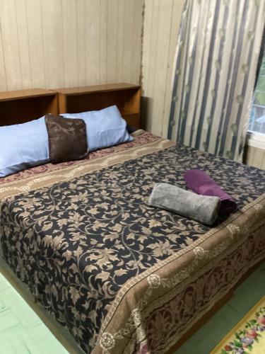 Llit o llits en una habitació de VeKay Apartment