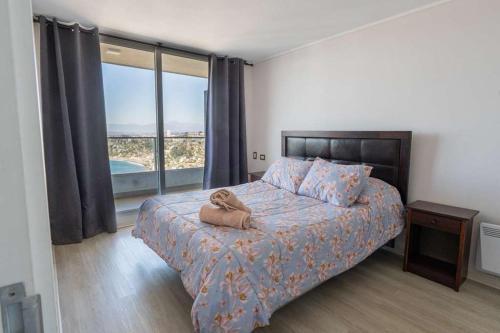 Postel nebo postele na pokoji v ubytování Vista al mar y relax total en el corazón de Concón