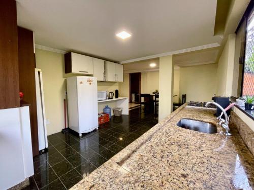 Una cocina o zona de cocina en Pousada Morada Coqueiros