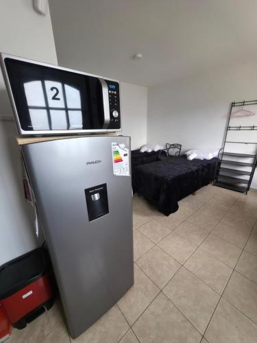 Ένα ή περισσότερα κρεβάτια σε δωμάτιο στο Aparts Valentyna El Chalten 2