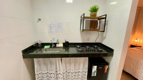 O bucătărie sau chicinetă la Hospedaria Central