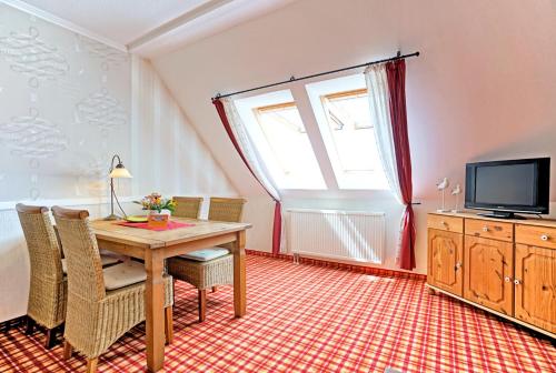 Hotel Godewindにあるテレビまたはエンターテインメントセンター