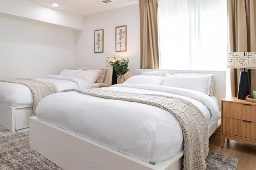 Giường trong phòng chung tại Premium 4-bedrooom House Best Location