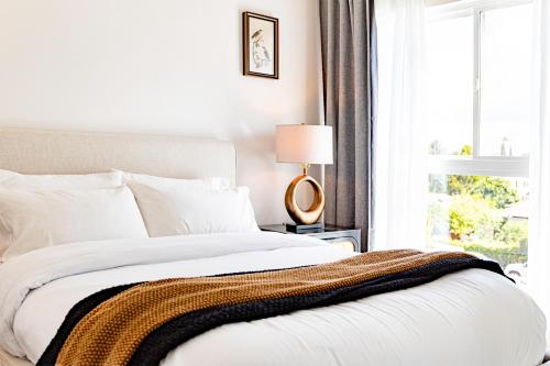 Giường trong phòng chung tại Premium 4-bedrooom House Best Location