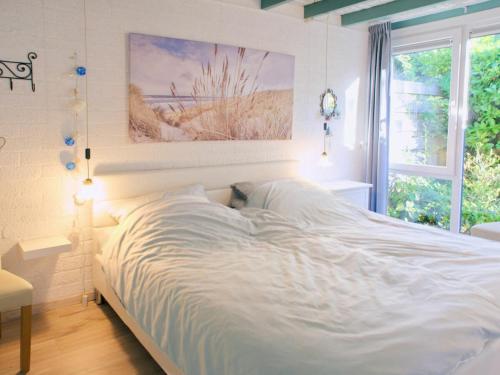 Ένα ή περισσότερα κρεβάτια σε δωμάτιο στο Holiday house in ouddorp with 2 bedrooms