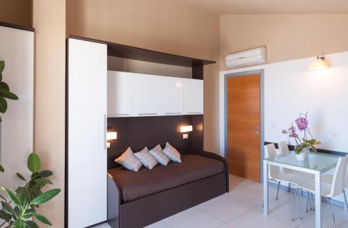 A bed or beds in a room at Residence Sottovento