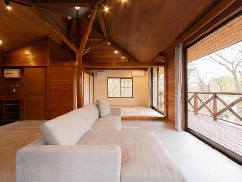 Postel nebo postele na pokoji v ubytování rinne 那須 Sauna Villa 2