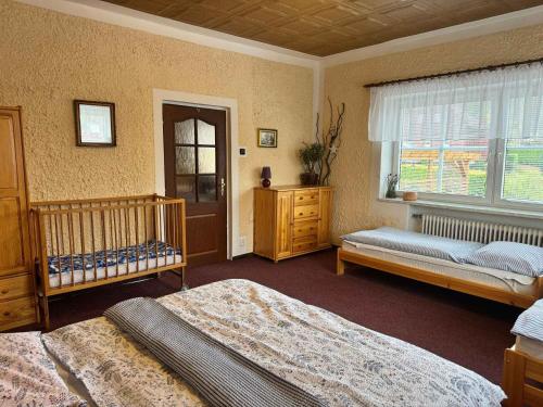 Postel nebo postele na pokoji v ubytování Apartment in Smrzovka 51888