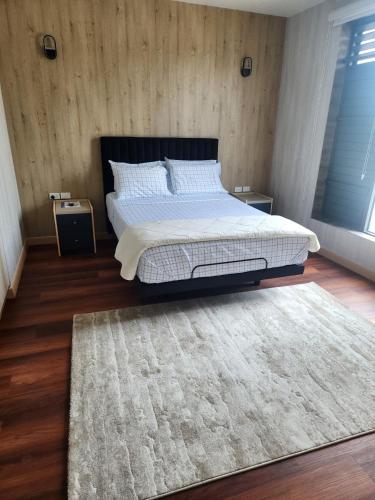 Llit o llits en una habitació de ICHA Apartments