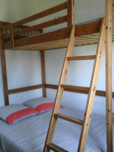 Μία ή περισσότερες κουκέτες σε δωμάτιο στο La Crielloise