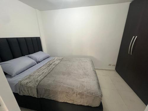 Postel nebo postele na pokoji v ubytování Homeway Lomas de las mercedes