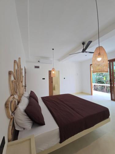 Postel nebo postele na pokoji v ubytování Bunky Monkey by Monara