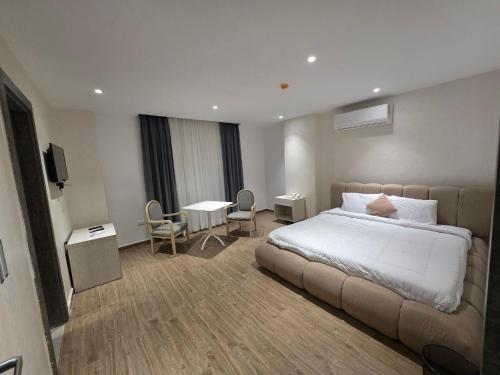 Giường trong phòng chung tại pyramids heaven hotel- فندق جنة الاهرامات