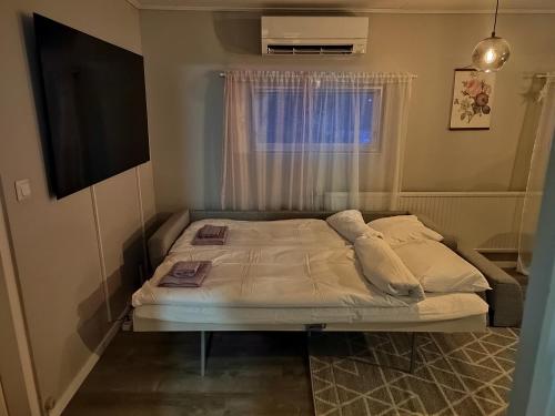 Postel nebo postele na pokoji v ubytování Happy husky home Rovaniemi