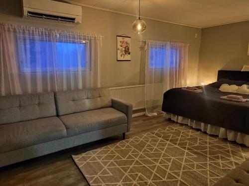 Postel nebo postele na pokoji v ubytování Happy husky home Rovaniemi