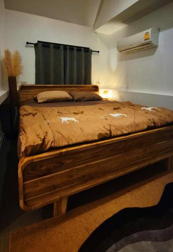 Postel nebo postele na pokoji v ubytování Seaside Cove at Chaloklum Bay Resort