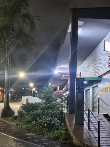 a gas station at night with the lights on at Kit Osaka in Brasilia