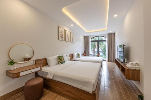 Ένα ή περισσότερα κρεβάτια σε δωμάτιο στο RAINBOW Motel 3