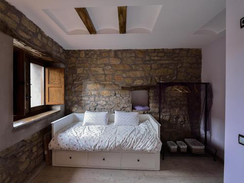 Llit o llits en una habitació de Ana de las Tejas Azules