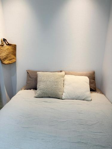 Ένα ή περισσότερα κρεβάτια σε δωμάτιο στο TOMI Hotel 神保町401