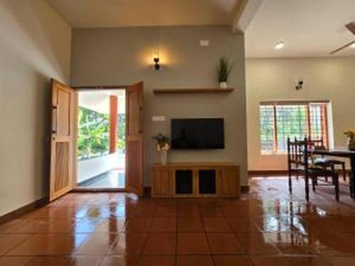 Billede fra billedgalleriet på Acrewood Farmhouse - Pool Villa i Vāzhākulam