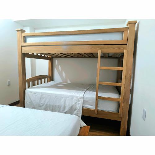 Ένα ή περισσότερα κρεβάτια σε δωμάτιο στο Posada Campestre en Doradal