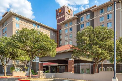 a rendering of the front of a hotel at La Quinta by Wyndham San Antonio Airport in San Antonio