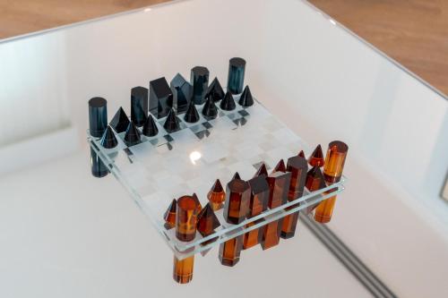 a wine rack with a bunch of wine bottles at Private villa in Dubai with swimming pool and huge garden in Dubai