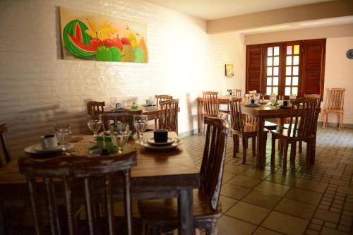 Reštaurácia alebo iné gastronomické zariadenie v ubytovaní Pousada Lua Vermelha