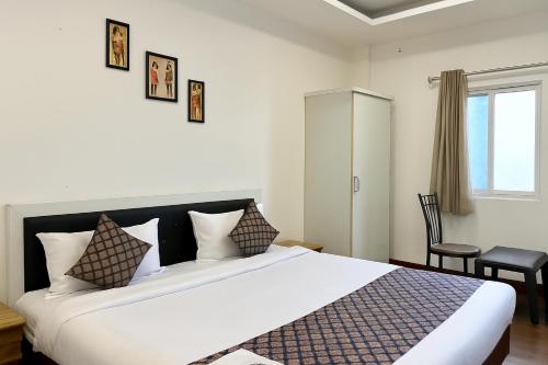 Un ou plusieurs lits dans un hébergement de l'établissement Hotel Seasons